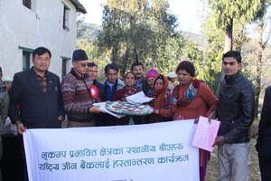 Farmers display collected  rare varieties of local beans, soybean and other crop seeds, at Seed Handover Event, Nepal. Credit: Bioversity International/D. Gauchan